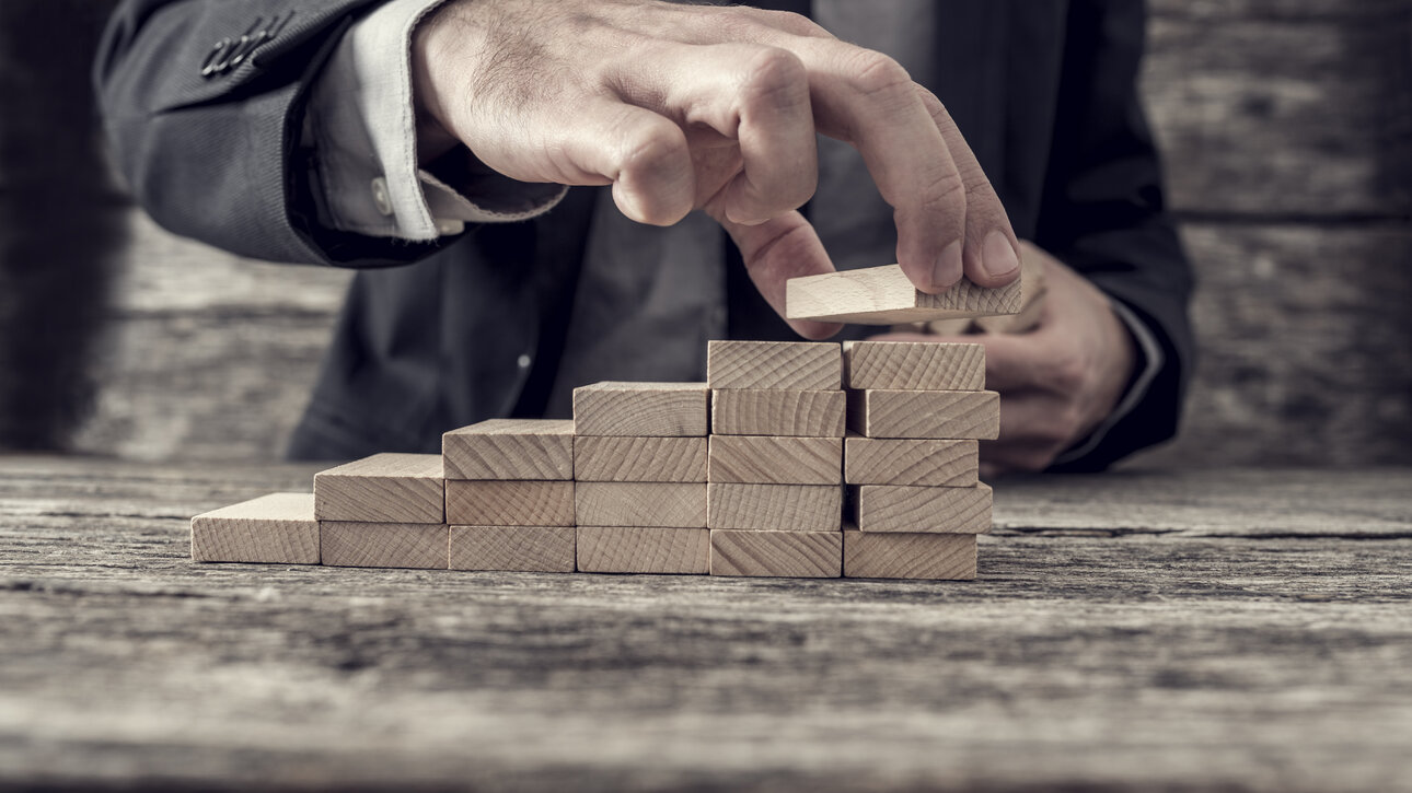 businessman-building-a-graph-or-ladder-of-success-P9NNLG6.thumb.jpg.29bc9a5782e93df2b4426d3202835588.jpg